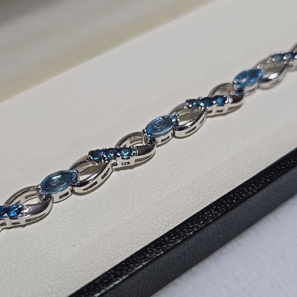 Sterling Silver and Blue Topaz Tennis Bracelet With Matching Necklace Pendant